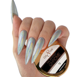 Hand with stiletto nails with a hologram chrome metallic silver color, holding a container of nail art effect chrome powder.
